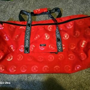 Crooks N Castles large red duffle bag